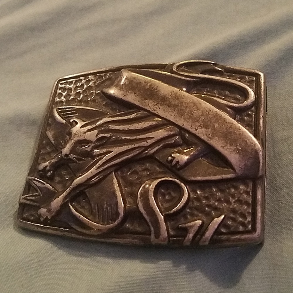 Panther belt buckle